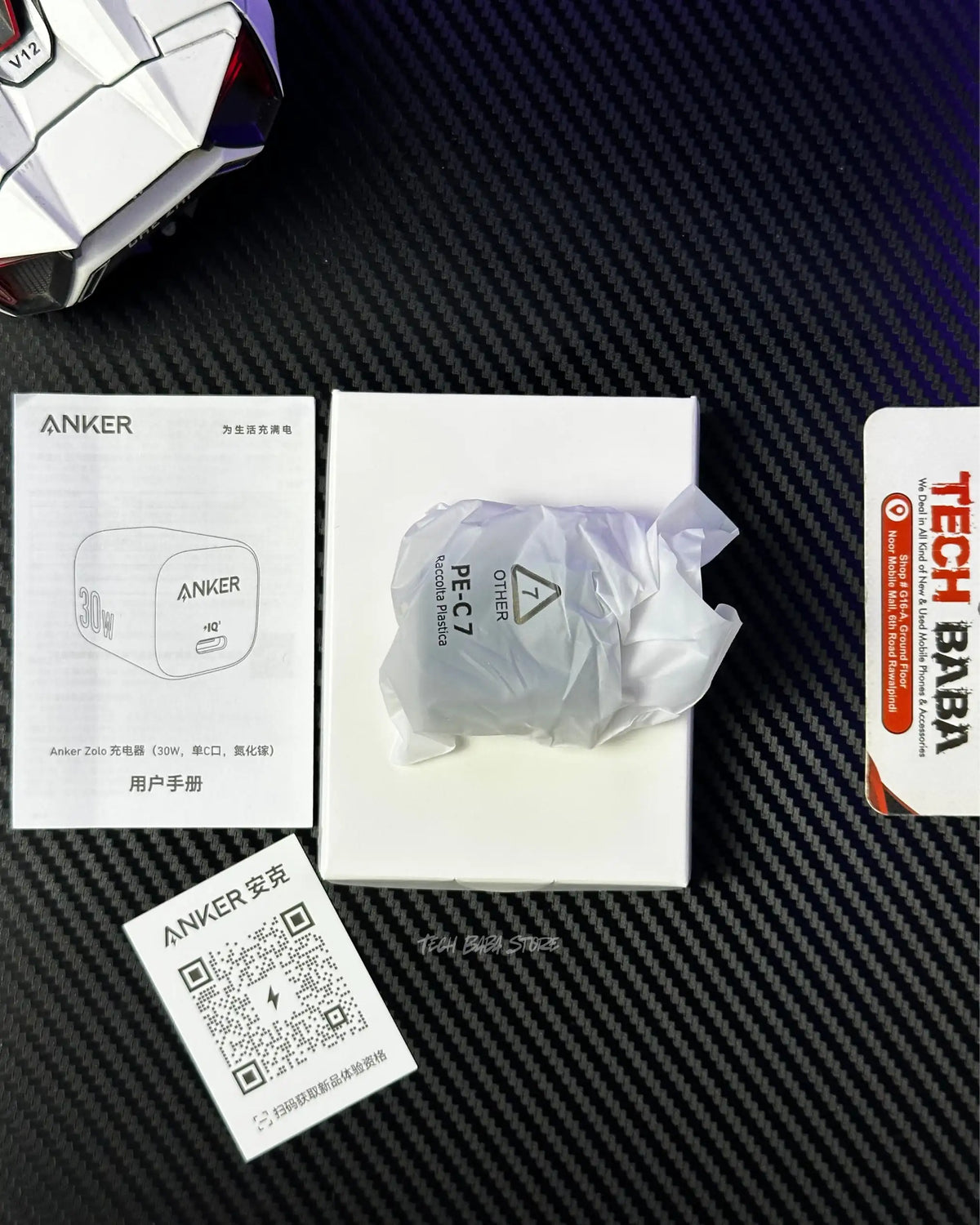 showing all items that comes in box of  Anker Zolo 30W Compact USB-C GaN Charger. picture by techbabastore.pk