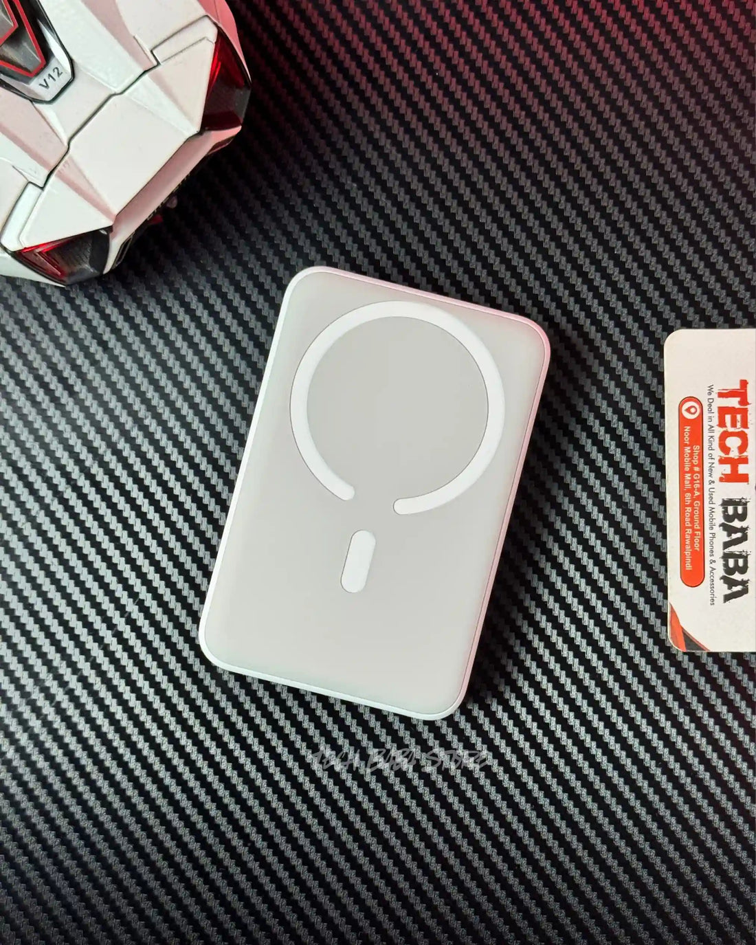 showing front view of Baseus PPCXM10 Wireless PowerBank which has magnetic wireless charging coil, picture by TechBabaStore.pk