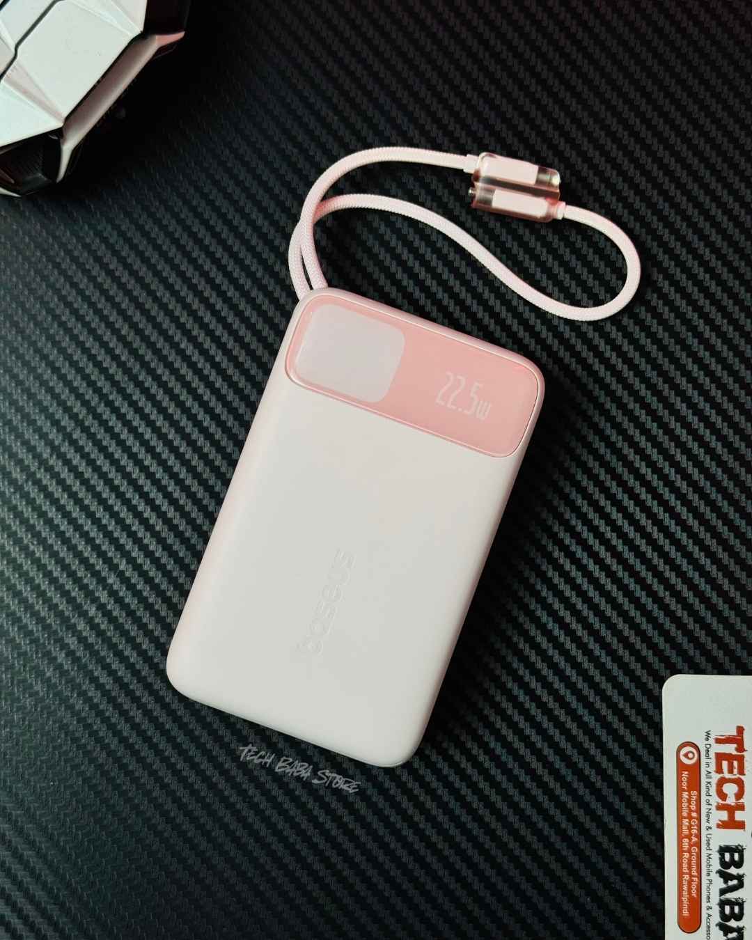 Showing a Pink colour Baseus Enerfill FC11 20000mAh 22.5W Power Bank closeup view. Picture by TechBabaStore.pk