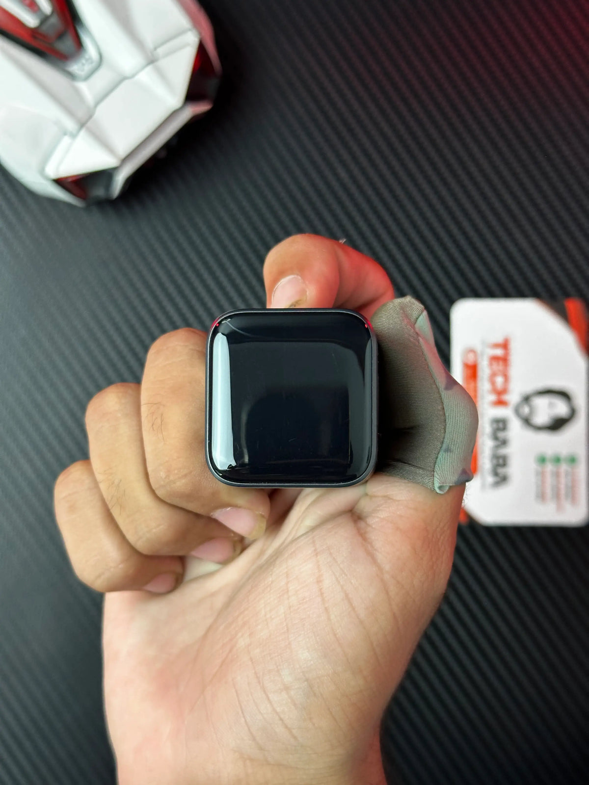 A hand holding nker_Nano_45W_Charger_With_Smart_Display which has showing display. picture by TechBabaStore.pk