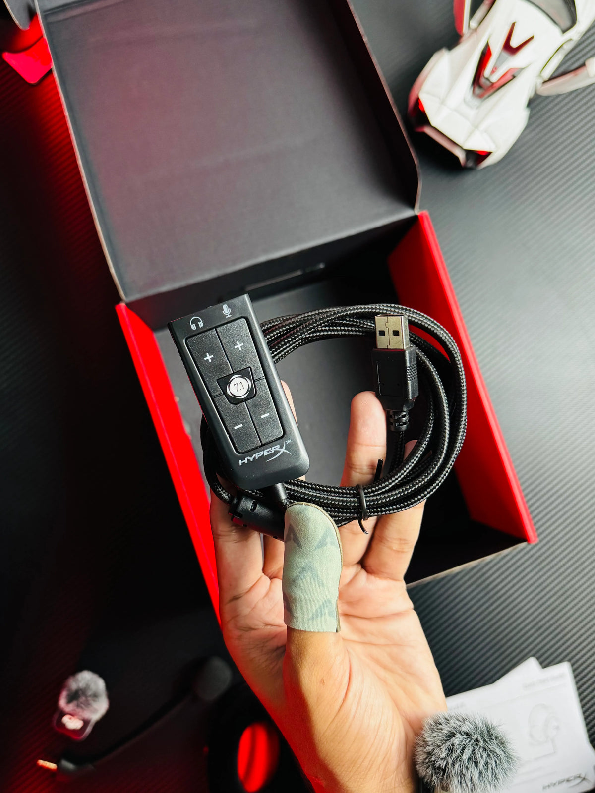 Picture of HyperX Cloud II Wired Gaming Headset's 7.1 Surround card shown with its USB-A Cable - Picture by TechBabaStore.pk