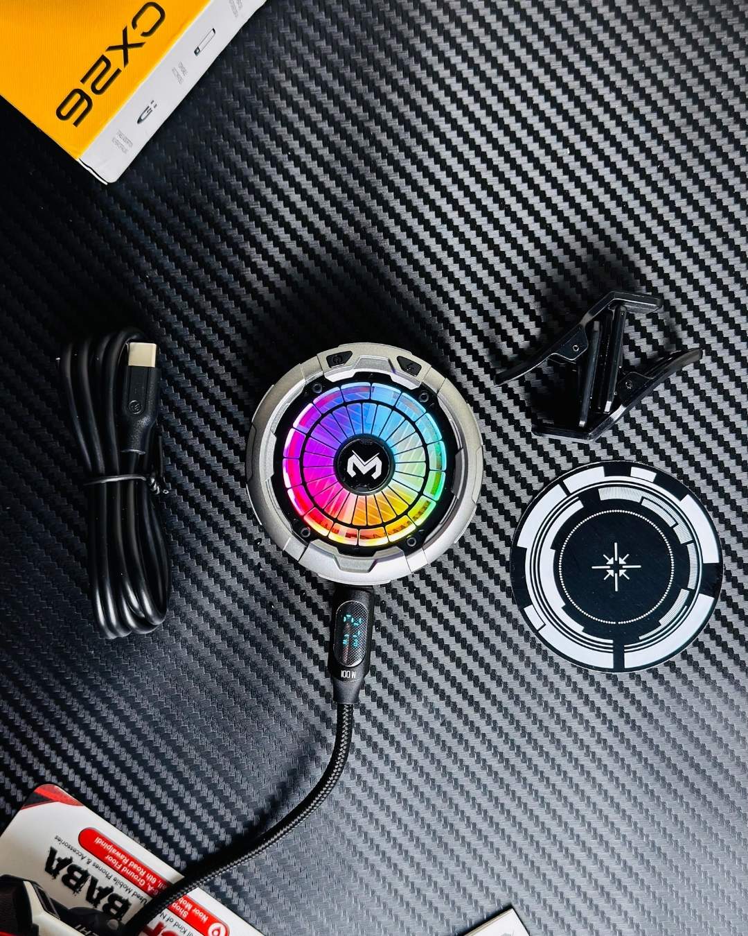 showing MEMO_CX26_Ultra_30W_Phone_Cooler, colling plate, charging cable, and clips. picture by techbabastore.pk