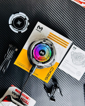 showing a MEMO CX26 Ultra 30W Phone Cooler, info book, charging cable, colling plate and clips. picture by techbabastore.pk