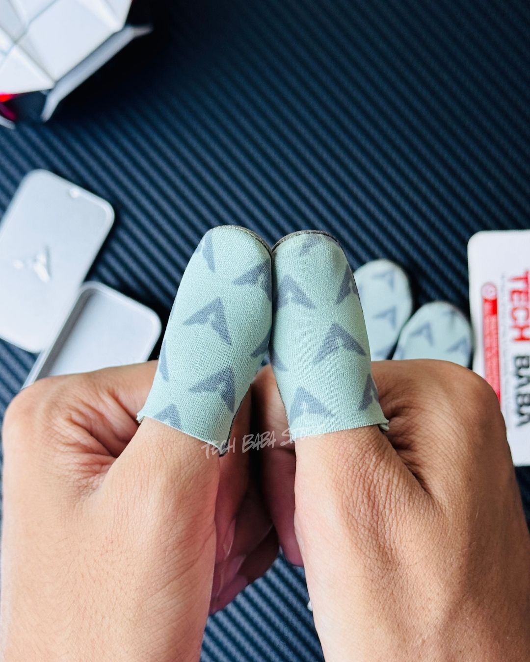 Both hands wearing 2 Piva DragonScale 2 thumb sleeeves in both hands thumbs. Picture by TechBabaStore.pk