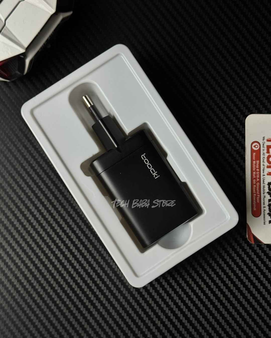Toocki RX-01 65W GaN Adapter out of the box unboxing picture, first look of Toocki RX-01 out of the box by TechBabaStore.pk