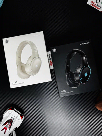 showing black and white Phoinikas Q6S Wireless Gaming Headset — Bluetooth 5.3, Detachable Mic, 30Hrs Battery | Best PUBG Headset Pakistan.picture by TechBabaStore.pk