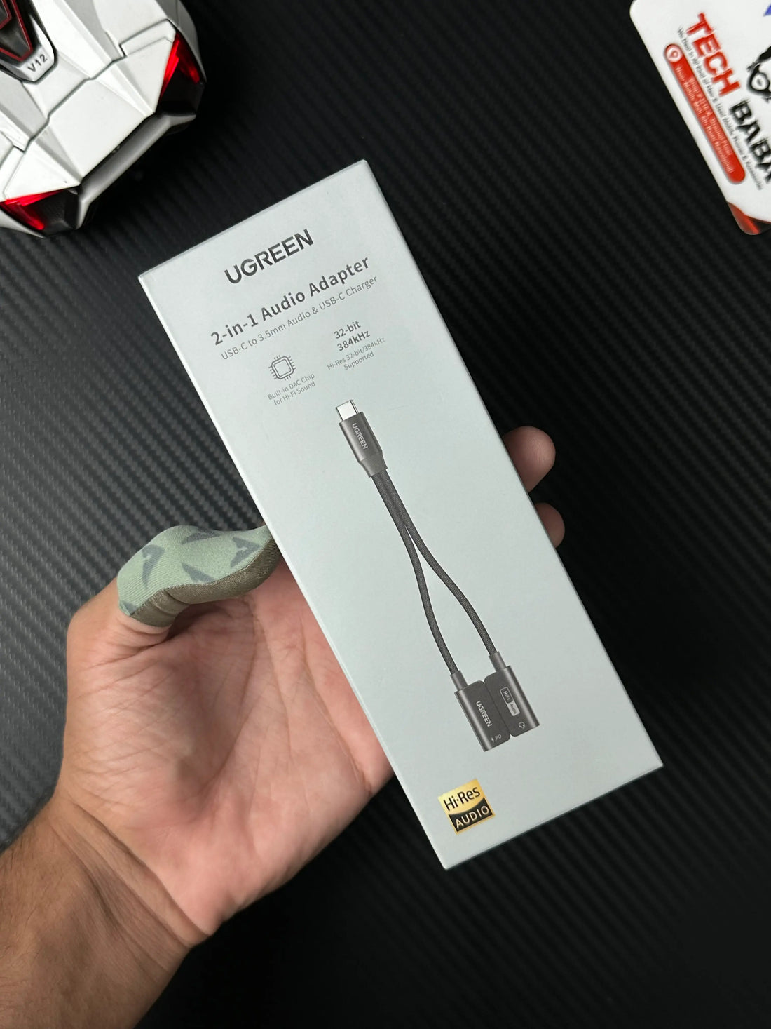 showing closeup shot ofUGREEN 25837 USB-C to 3.5mm Audio Adapter Pakistan.picture by TechBabaStore.pk
