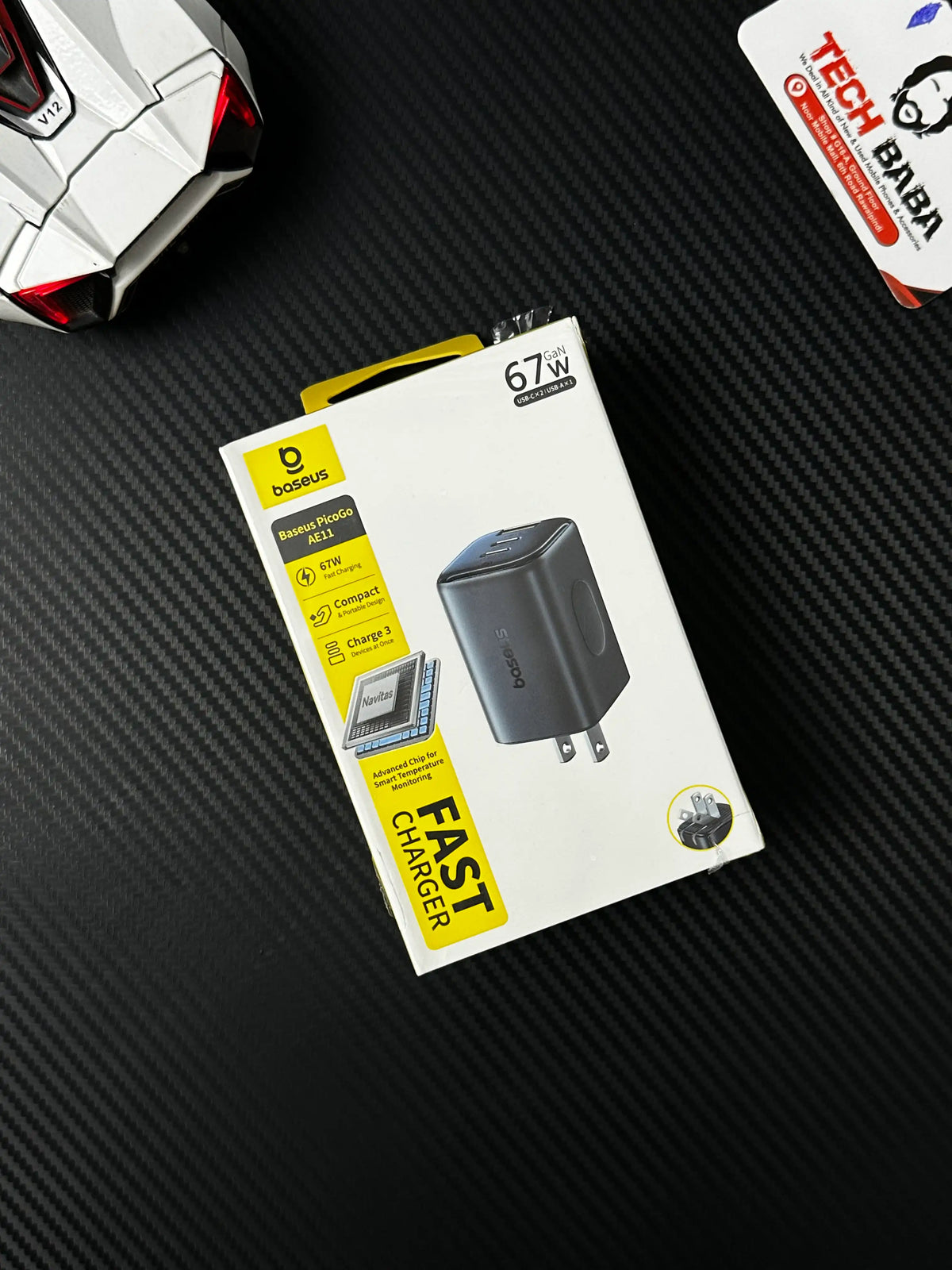 showing front view  of Baseus PicoGo AE11 67W GaN Fast Charger 2C+U — Dual USB-C + USB-A, PD3.0/QC4.0/PPS.picture by Techbabastore.pk