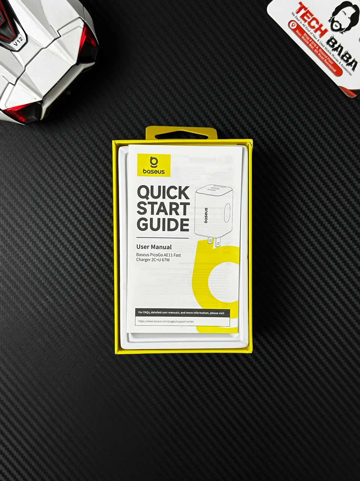 showing open box of Baseus PicoGo AE11 67W GaN Fast Charger 2C+U — Dual USB-C + USB-A, PD3.0/QC4.0/PPS.picture by
Techbabastore.pk