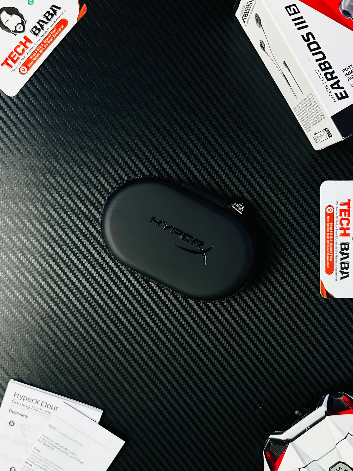 showing small pouch of HyperX Cloud Earbuds III S USB-C Gaming Earbuds-picture by techBabaStore.pk