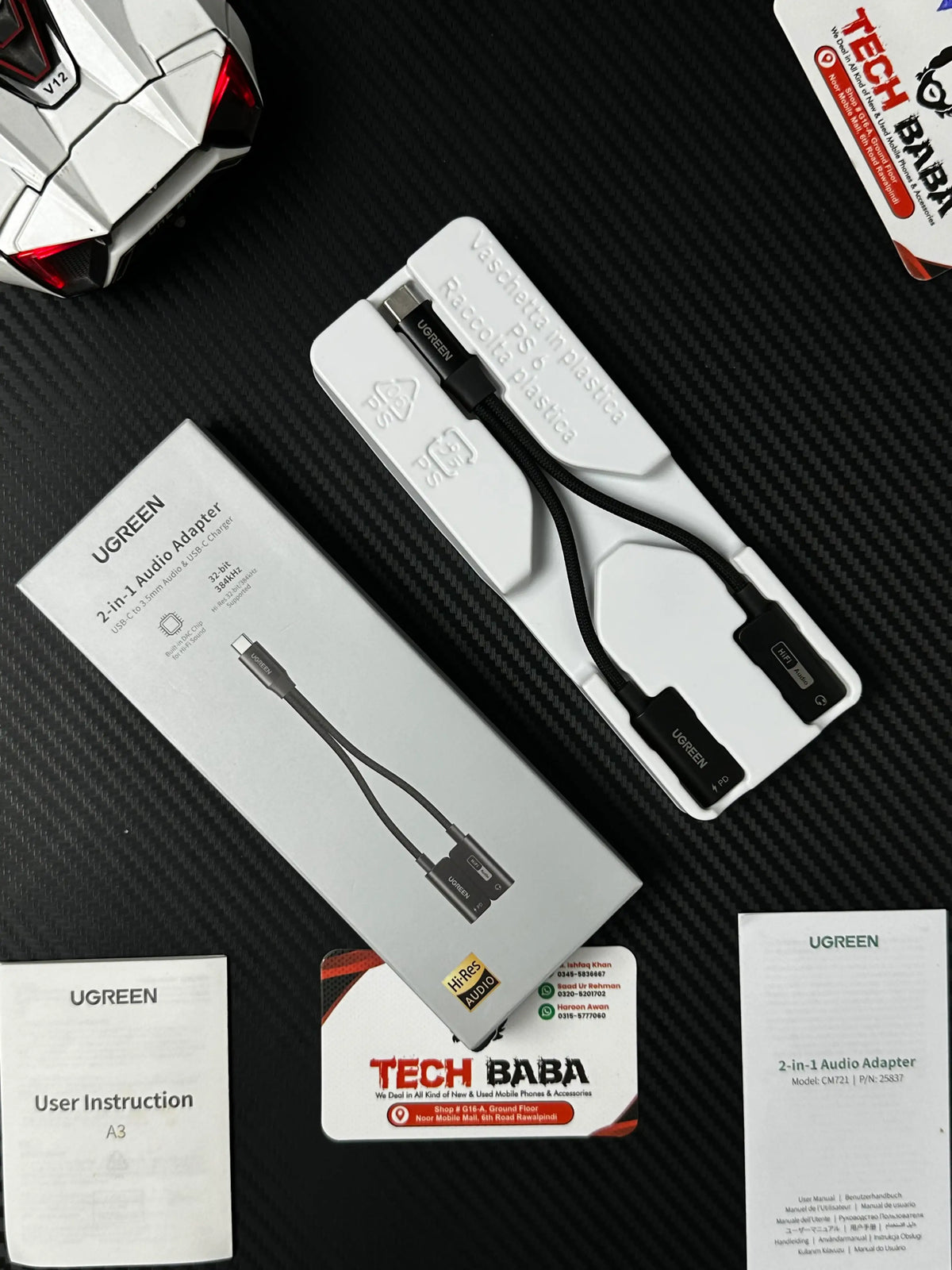 showing closeup shot ofUGREEN 25837 USB-C to 3.5mm Audio Adapter Pakistan.picture by TechBabaStore.pk